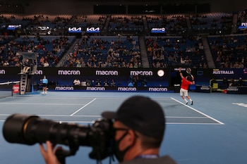 Spain's Roberto Bautista Agut serves during a match against Australia's Alex de Minaur in the group stage of the ATP Cup at Melbourne Park in Melbourne, Australia, February 2, 2021. REUTERS/Loren Elliott