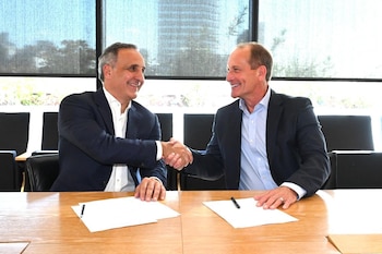 Marcos Bulgheroni, CEO de PAE junto a Doug Lawler, presidente y director ejecutivo de Continental Resources