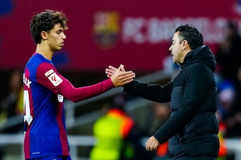 Joao Félix y Xavi (EFE/Alberto Estévez)