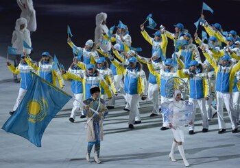 Kazakhstan's flag bearer, cross-country skier