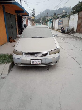 Ceniza cubrió autos en Edomex