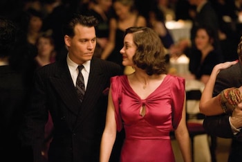 Christian Bale y Marion Cotillard