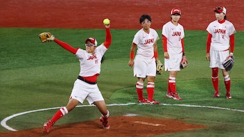 Tokyo 2020 Olympics - Softball - Women - Finals - Gold Medal Game - Japan v United States - Yokohama Baseball Stadium - Yokohama, Japan - July 27, 2021. Miu Goto of Japan (L) in action. REUTERS/Jorge Silva