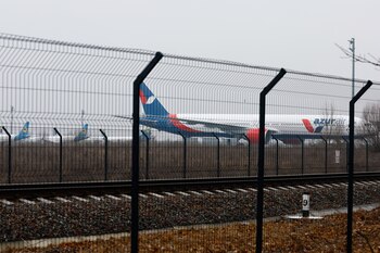 Parked planes are seen at Kyiv Airport after Russian President Vladimir Putin authorized a military operation in eastern Ukraine, February 24, 2022. REUTERS/Umit Bektas