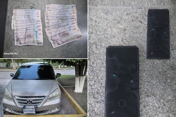 Billetes de cien quetzales, una minivan Honda plateada con matrícula P433GDS de Guatemala y dos teléfonos móviles negros en superficies de concreto.