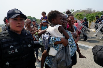 Inmigrantes intentando llegar a Estados