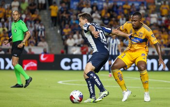 Aug 8, 2023; Houston, TX, USA; CF Monterrey midfielder Sergio Canales (10) shields Tigres defender Samir De Souza (3) in the second half at Shell Energy Stadium. Mandatory Credit: Thomas Shea-USA TODAY Sports