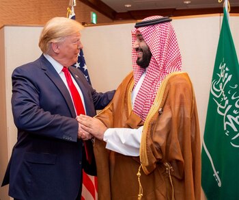 FILE PHOTO: Saudi Arabia's Crown Prince Mohammed bin Salman shakes hands with U.S. President Donald Trump, at the G20 leaders summit in Osaka, Japan, June 29, 2019. Bandar Algaloud/Courtesy of Saudi Royal Court/Handout via REUTERS ATTENTION EDITORS - THIS PICTURE WAS PROVIDED BY A THIRD PARTY/File Photo
