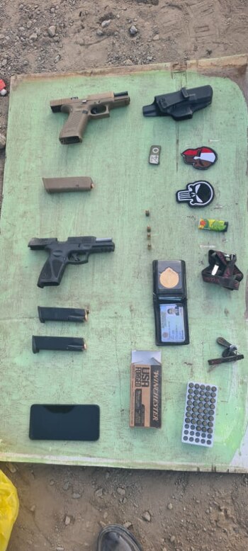 Armas incautadas de extorsionadores.