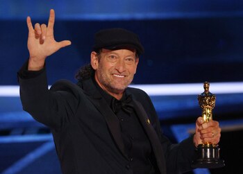 Troy Kotsur accepts the Oscar for Best Supporting Actor in "CODA" at the 94th Academy Awards in Hollywood, Los Angeles, California, U.S., March 27, 2022. REUTERS/Brian Snyder