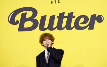 K-pop boy band BTS member V poses for photographs during a photo opportunity promoting their new single 'Butter' in Seoul, South Korea, May 21, 2021. REUTERS/Kim Hong-Ji