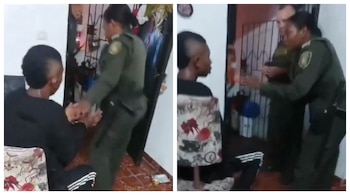 Policía protegiendo a delincuente