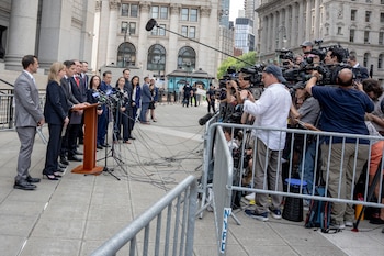 Jamie McDonald, the U.S. Attorney for the Southern District of New York, speaks to reporters after a hearing outside of the Thurgood Marshall United States Courthouse in Manhattan on Friday, Aug. 14, 2026. McDonald that his office does not have a plea agreement with Luigi Mangione and said that it would seek the maximum sentence of life in prison. (Anna Connors/The New York Times)