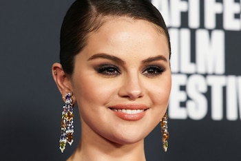 Selena Gomez attends a premiere