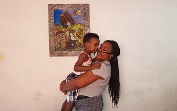 Afrik3 Reina y su hijo