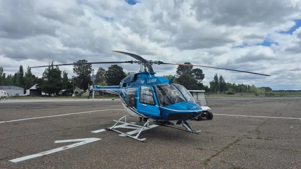 El helicoptero que participa de las tareas de búsqueda