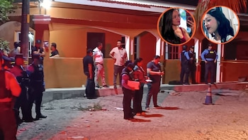 Elementos policiales acordonan la entrada de la vivienda en la colonia Montefresco, donde quedaron los cuerpos sin vida de Yaritza Murillo y Katherine Oliva (Cortesía El Atlántico HN).