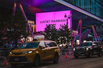FILE Ñ A marquee announces the marriage of Taylor Swift and Travis Kelce outside Madison Square Garden in New York, July 3, 2026. On Monday, Oct. 26, The Daily Mail published what it described as digital renderings of the altar and reception area from an unnamed source, though none of those details have been verified by The Times or by SwiftÕs team, who would not comment on the report. (Lanna Apisukh/The New York Times)
