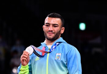 Tokyo 2020 Olympics - Wrestling - Greco-Roman - Men's 67kg - Medal Ceremony - Makuhari Messe Hall A, Chiba, Japan - August 4, 2021. Silver medallist Parviz Nasibov of Ukraine poses with his medal REUTERS/Piroschka Van De Wouw