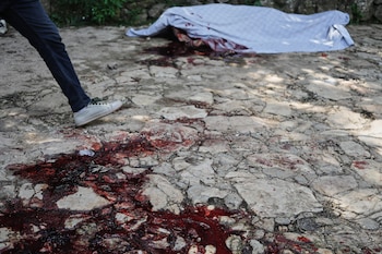 Los enfrentamientos armados en Santo obstaculizan las operaciones de búsqueda terrestre y aérea de las tropas. (AP Foto/Odelyn Joseph)