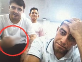 Gestos de burla y amenazas que hicieron los integrantes de la organización criminal durante la audiencia de imputación de cargos - crédito captura Semana/API