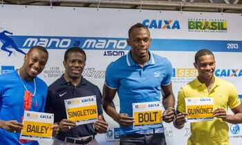 Alex Quiñónez y Usain Bolt