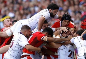 Jugadores georgianos se pelean con galeses durante el partido de grupos del Mundial 2023 (REUTERS/Stephane Mahe)