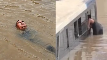 Sujeto es intervenido por nadar en aniego de Villa María del Triunfo y acercarse a un bus atrapado durante la inundación