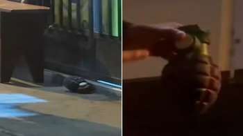 Objeto oscuro de forma ovoide y textura corrugada en el suelo. Una mano sostiene el mismo objeto oscuro con un mecanismo superior