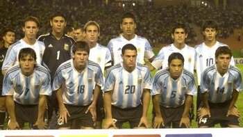 Peirone (#20) y Messi (#18)