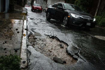 Los baches representan un riesgo