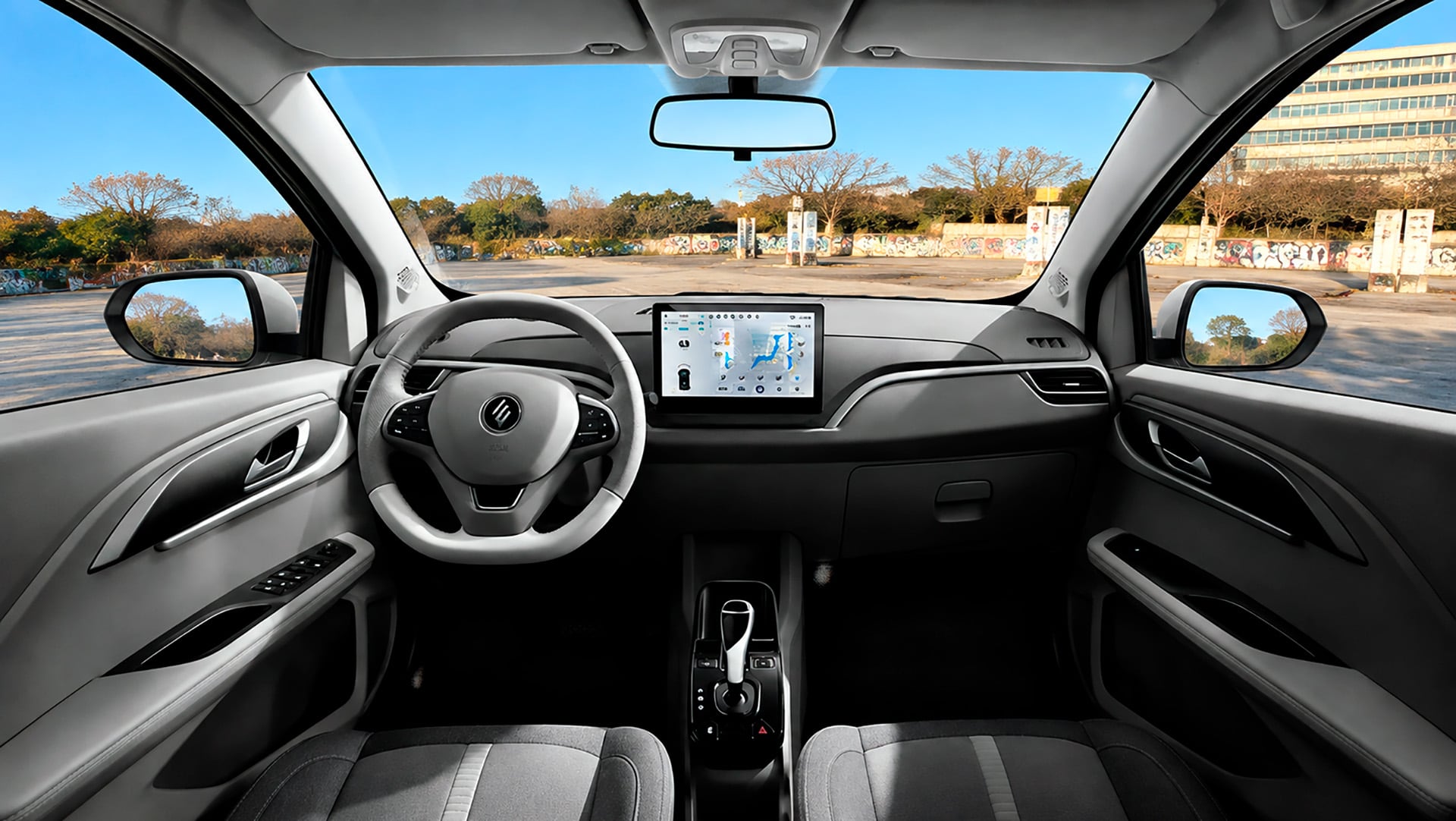 El interior del JMEV Easy 3 es minimalista y concentra todo en la pantalla central de 10