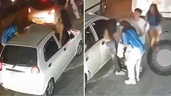 Tras la caída en Armenia, otra mujer, el conductor y una persona que descendió de su vehículo acudieron a auxiliarla.- crédito Captura de video