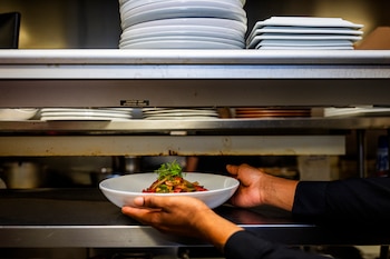 A dish that includes both crab and crawfish at Twisted Soul Cookhouse &Pours in Atlanta, Oct. 1, 2026. Fewer orders and higher costs are squeezing restaurants big and small as people on GLP-1 weight-loss drugs eat and drink less when dining out. (Audra Melton/The New York Times)