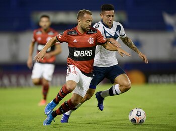 Everton Ribeiro y Francisco Ortega