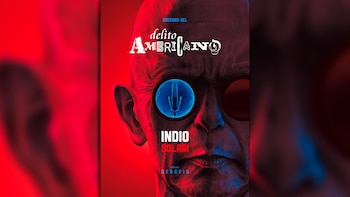 Primer plano de una portada de libro con un rostro calvo y gafas oscuras, una de ellas con un círculo azul brillante y una figura humana invertida, sobre fondo rojo