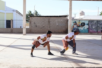 Jugadores de ulama de antebrazo