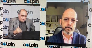 Ricardo Calderón (der), director de