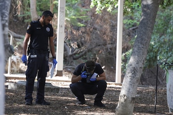 Israeli emergency responders work at