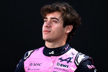 La sonrisa de Colapinto antes