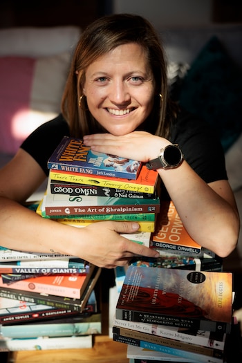 Lauren Bergen, who has been in the same reading group with Lauren Blatter for 15 years, in South Lake Tahoe, Calif., Aug. 6, 2026. Bergen believes in sticking it out, and recently finished “Yesteryear,” a novel she didn’t like at all. (Max Whittaker/The New York Times)