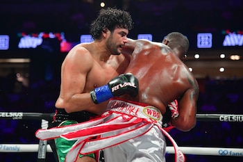 Jun 28, 2025; Anaheim, California, USA; Zurdo Ramirez fights against Yuniel Dorticos at Honda Center. Mandatory Credit: Gary A. Vasquez-Imagn Images