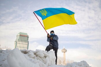 A boy waves a Ukrainian