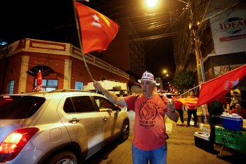 Peña y su compañero de