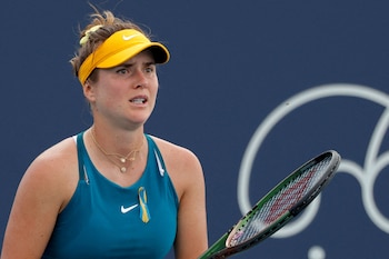 FILE PHOTO: Mar 24, 2022; Miami Gardens, FL, USA; Elina Svitolina (UKR) prepares to receive serve against Heather Watson (GBR) (not pictured) in a second round women's singles match in the Miami Open at Hard Rock Stadium. Mandatory Credit: Geoff Burke-USA TODAY Sports/File Photo
