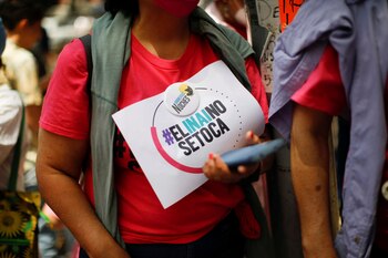 People attend a protest in