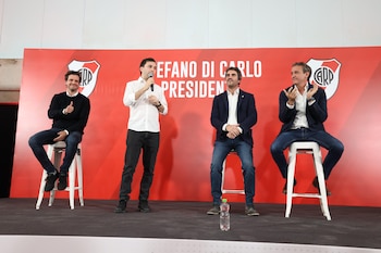 Di Carlo junto a sus