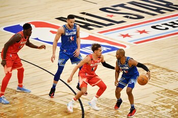 Chris Paul y Trae Young,