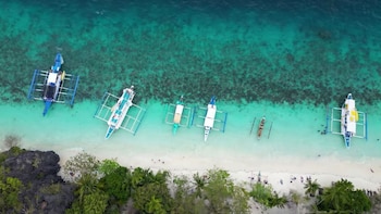 Palmeras, lagunas y 33 sitios de buceo: así es Entalula Beach, la playa filipina que reescribió el mapa del turismo en Asia