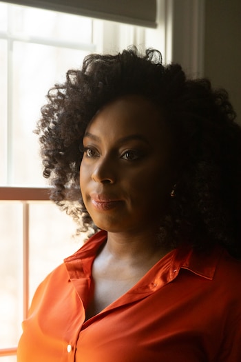 FILE — Chimamanda Ngozi Adichie in Maryland, Feb. 21, 2025. Adichie has moved countless readers with her novels about Nigerians at home and abroad. After the death in Lagos of her toddler son, her homeland no longer feels as much like home. (Schaun Champion/The New York Times)